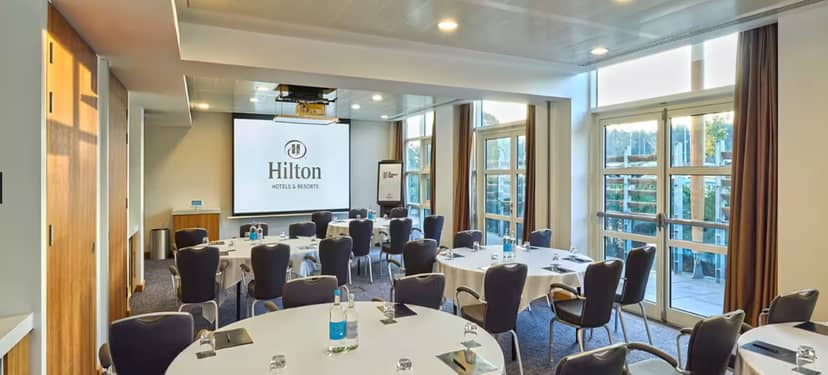 Sir Bobby Robson Ballroom at Hilton, bright meeting room for corporate events and presentations.