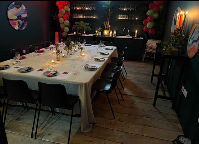 Elegant dining table setup in cozy Studio 57, perfect for private events and gatherings.