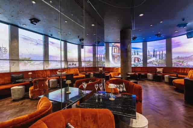 Byrd Hotel lounge with panoramic projection walls for VIP networking and corporate receptions.