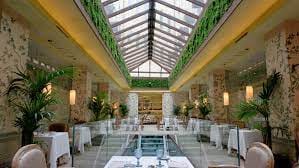 Invernadero dining venue at Urso Hotel with glass ceiling, perfect for upscale events.