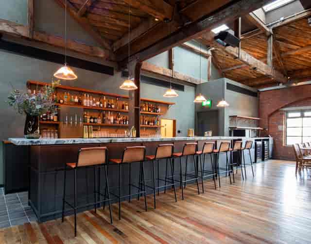 Timber Loft bar with rustic design, ideal for networking events and cocktail receptions.