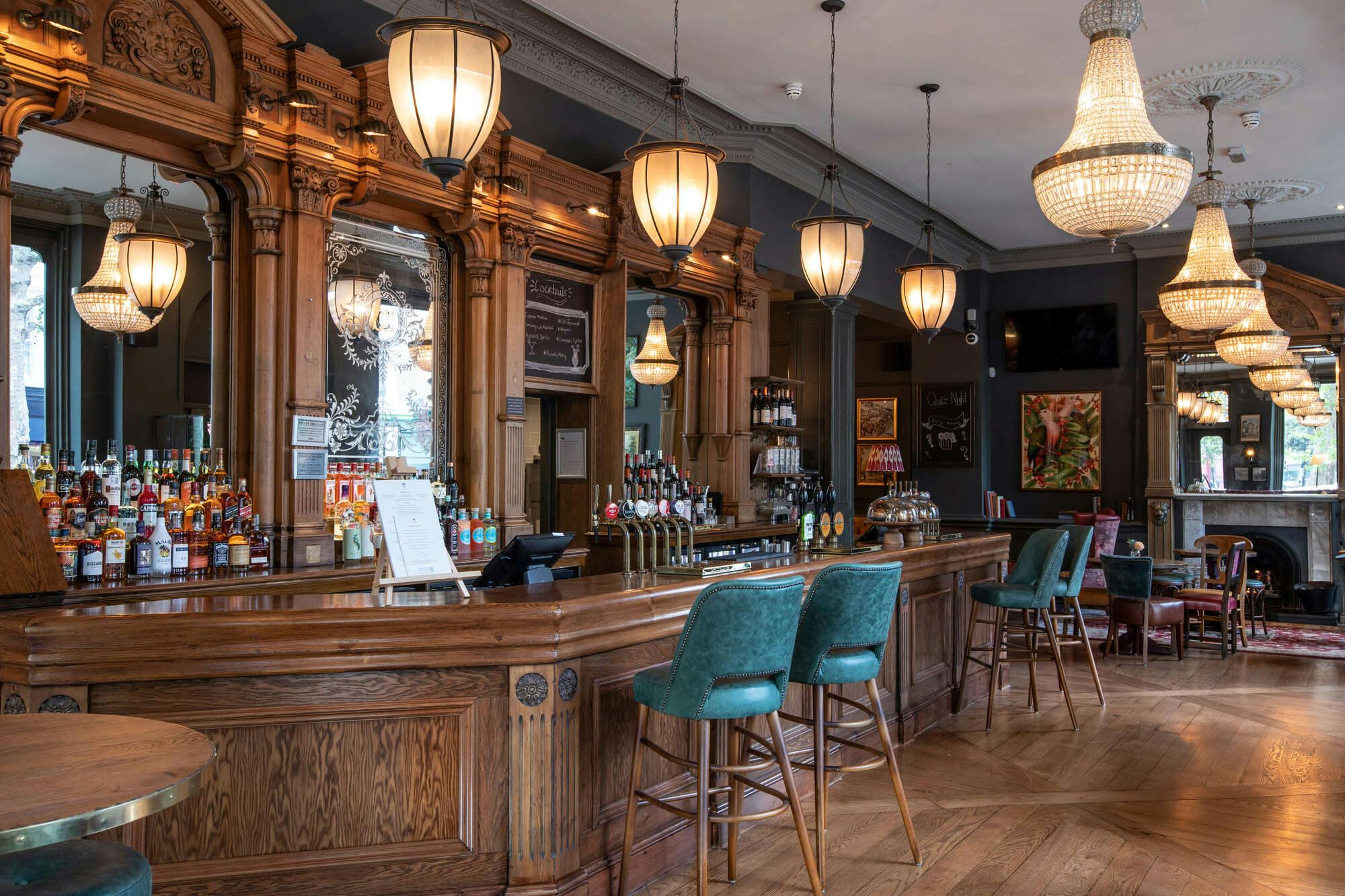 Stylish bar at Brook Green Hotel, ideal for cocktail receptions and networking events.
