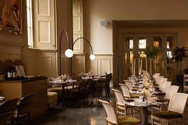 Private dining room in Ochre with elegant decor for intimate gatherings and corporate events.