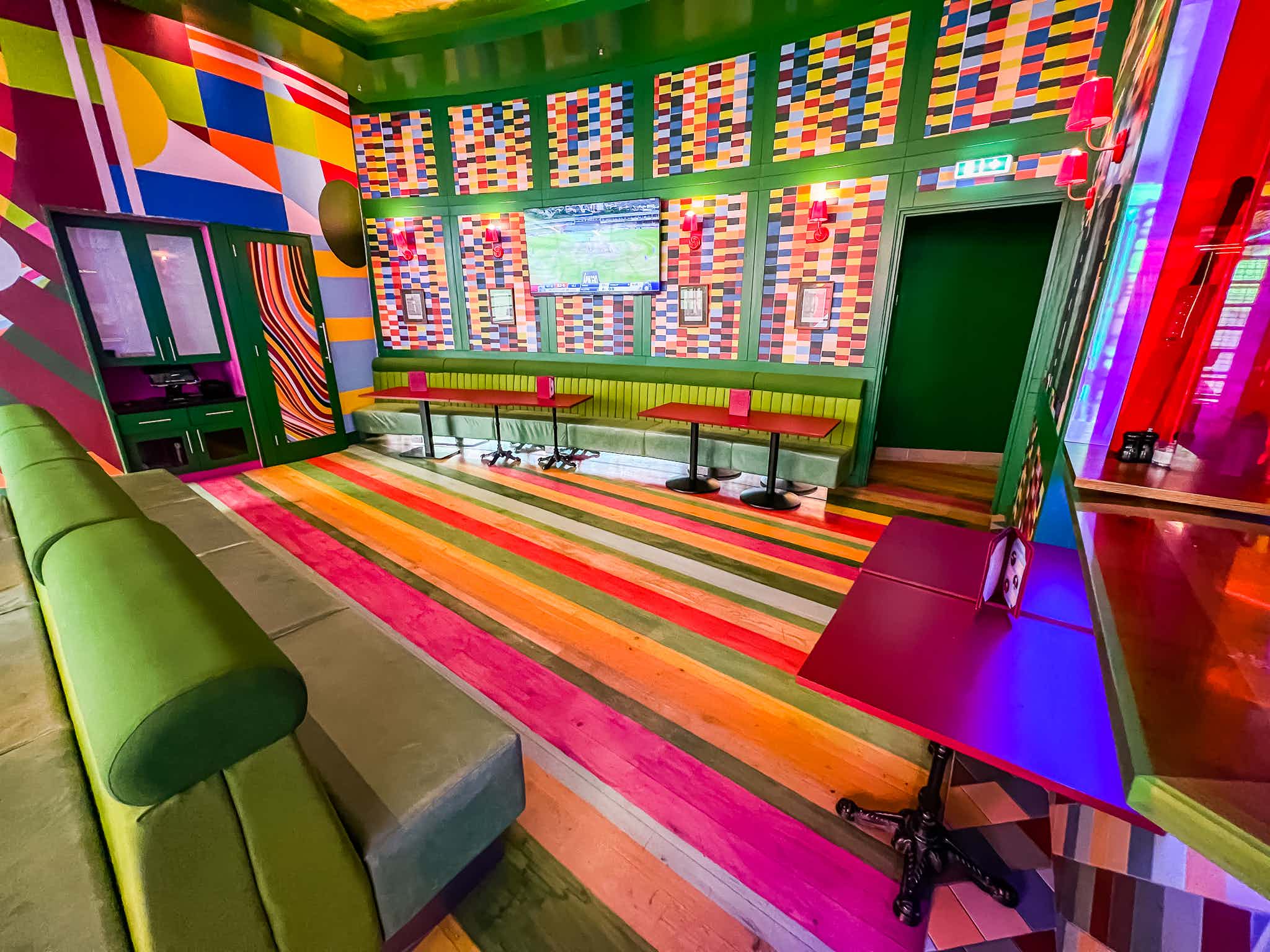 Vibrant event space at The Arena, ideal for casual gatherings and creative meetings. - Banner