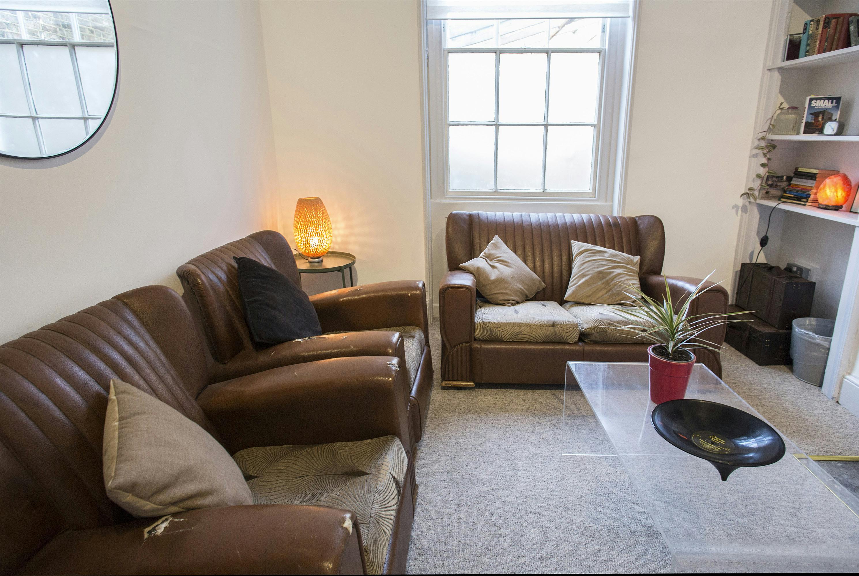 Cozy lounge in Anomalous Space, ideal for meetings and brainstorming sessions.