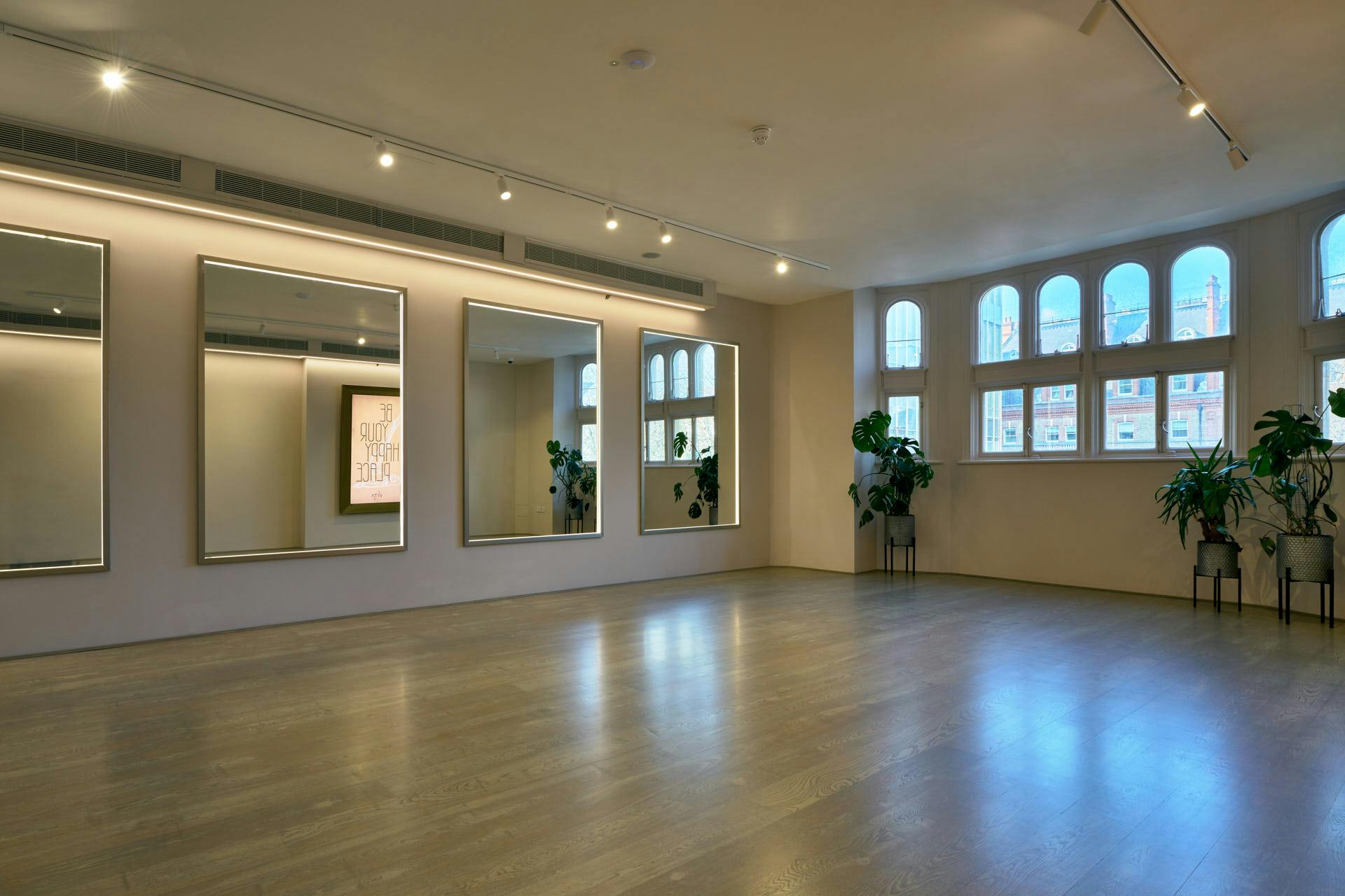 Bliss Studio at Vita Boutique Fitness: bright event space with mirrors for workshops and gatherings.