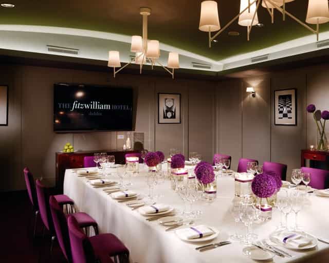 Fitzwilliam Room, Dublin: elegant meeting space with floral centerpieces for events.