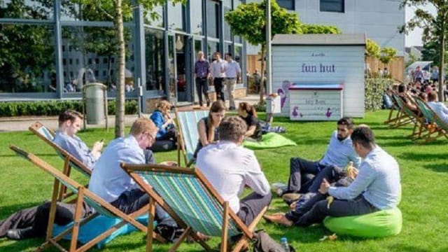Vibrant outdoor networking area in Birchwood Park with relaxed seating for events.
