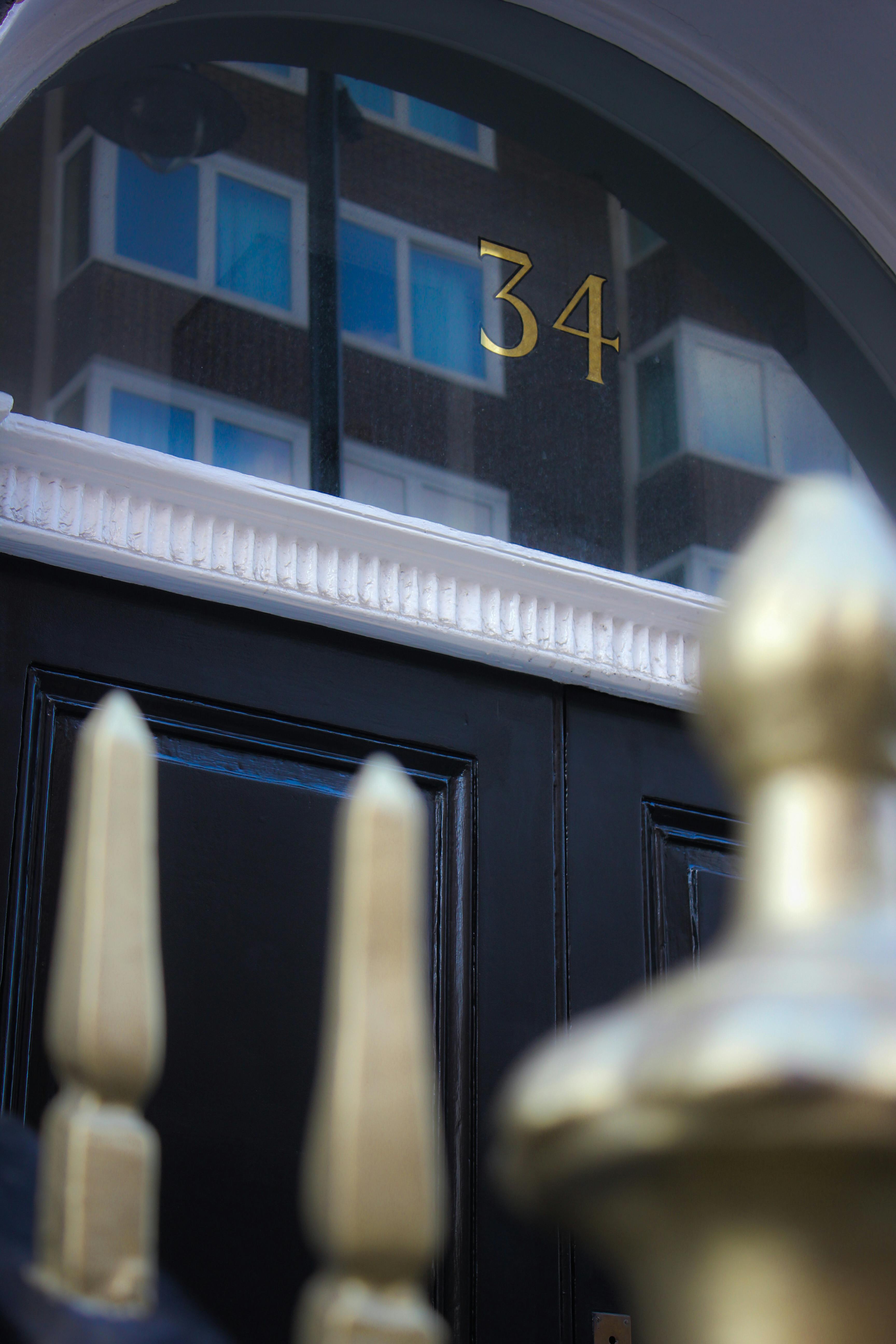 Elegant entrance of 34 Bloomsbury with classic black door, ideal for upscale events.