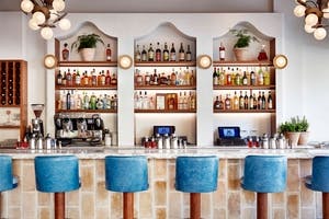 Stylish bar at Pizzeria Mozza, perfect for networking events and cocktail receptions.