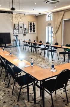 Meeting room at Hyatt House Sandton with U-shaped layout for professional gatherings.