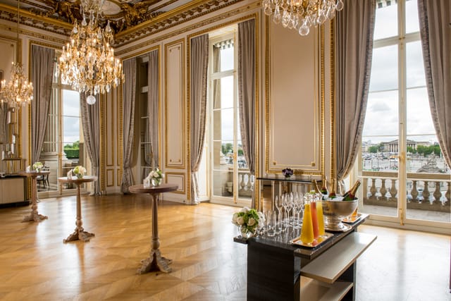 Elegant event space with chandeliers, ideal for receptions and formal gatherings.