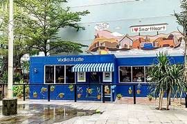 Dog Restaurant with blue exterior, perfect for casual meetings and social events.