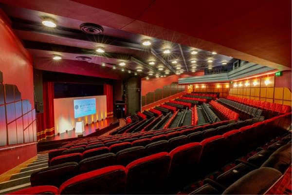 Shaw Theatre auditorium with tiered seating, ideal for conferences and presentations.