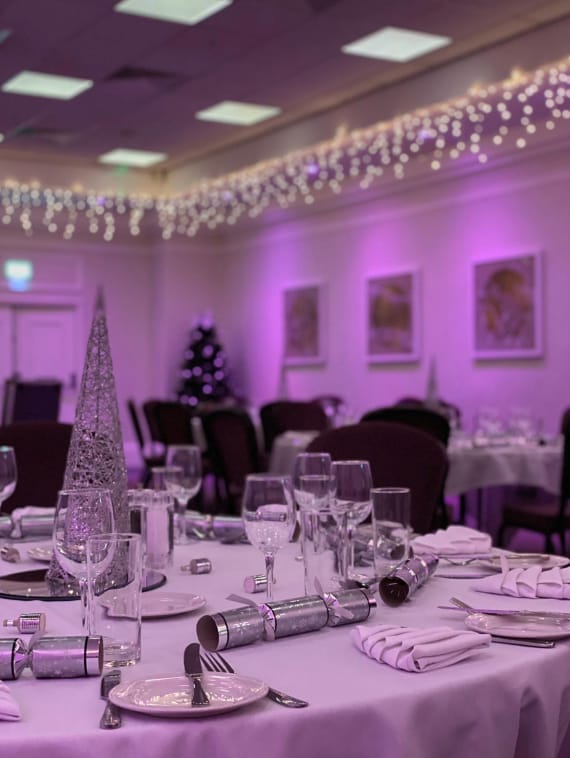 Elegant dining space in Wembley Suite, Hilton Nottingham for festive events and galas.