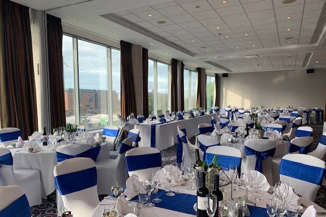 Radisson Blu Hotel Liverpool event space with elegant blue accents, ideal for weddings and corporate events. - Banner
