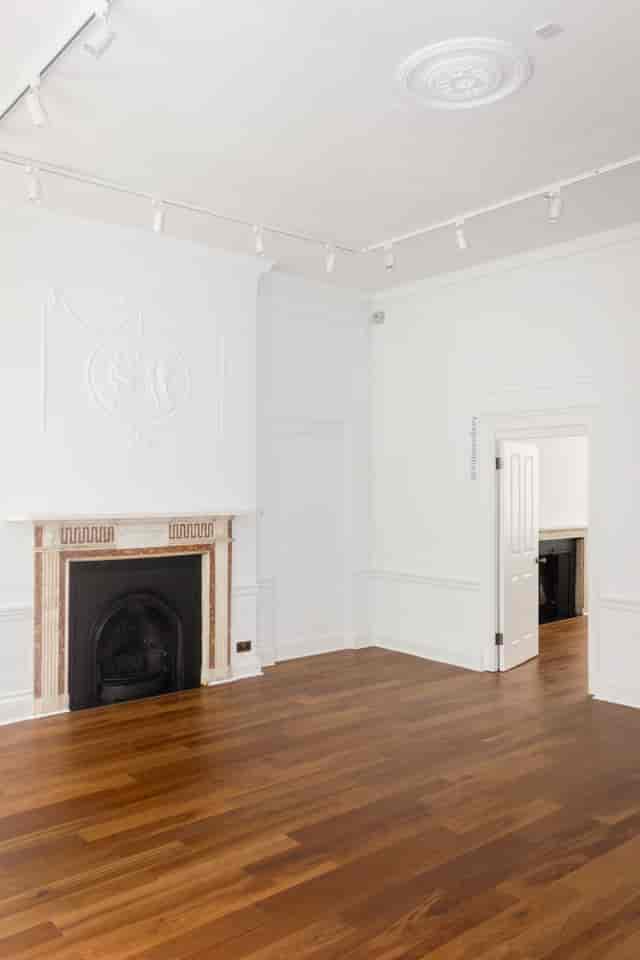 Morrell Room event space with fireplace, ideal for intimate gatherings and meetings.