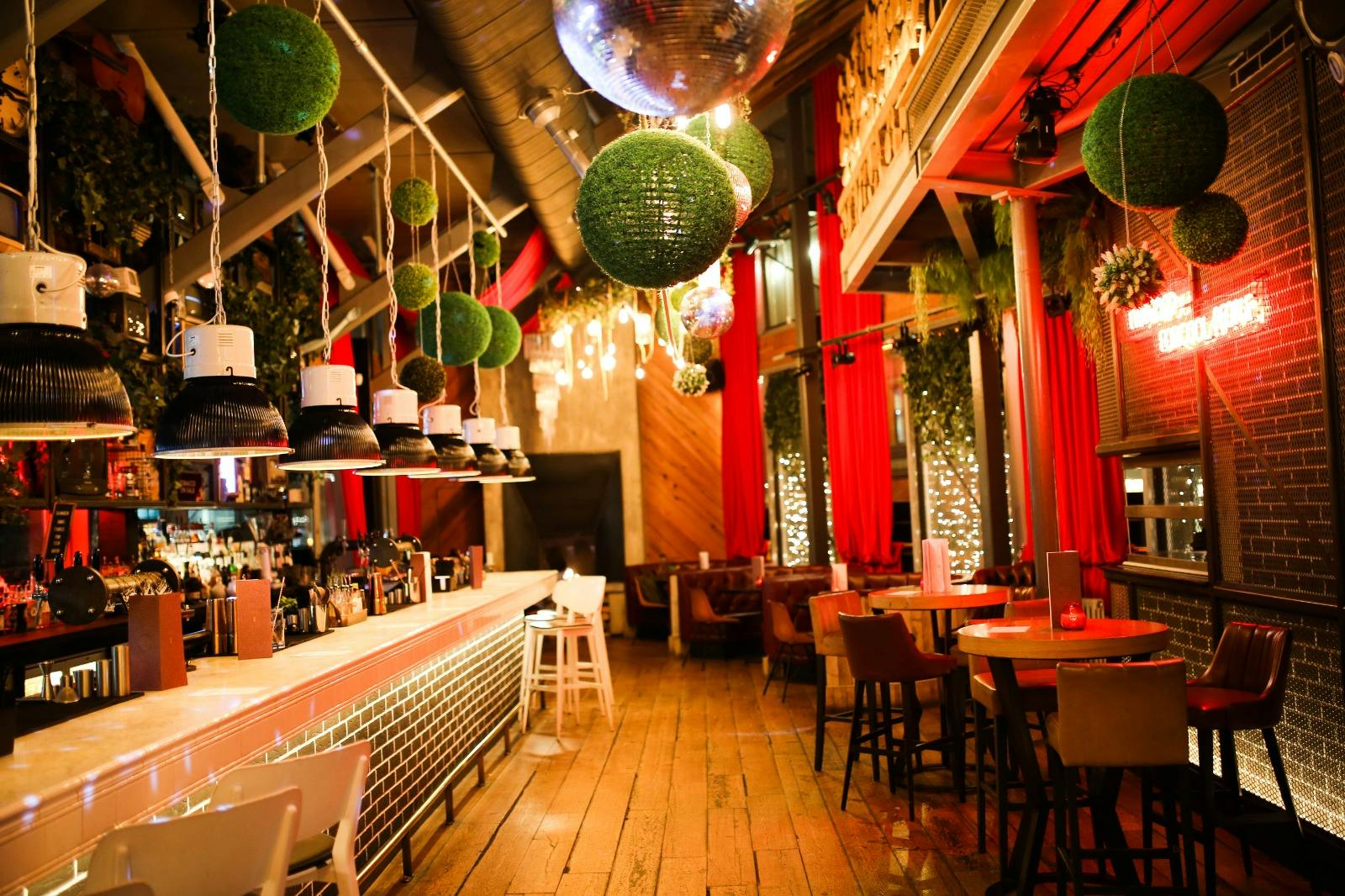 Vibrant Impossible Manchester bar with unique decor, perfect for events and gatherings.