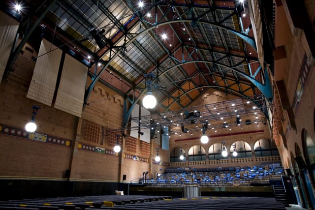 Spacious Hall 1 at Amsterdam Beurs Van Berlage, perfect for conferences and performances.