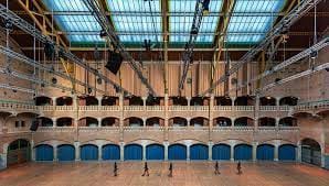 Spacious Amsterdam Beurs Van Berlage hall with high ceilings for conferences and exhibitions.