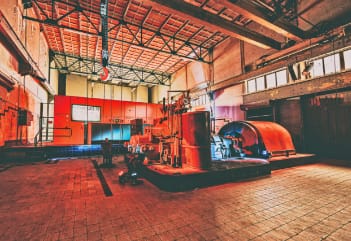 Spacious industrial venue with high ceilings for unique events in SugarFactory.