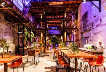 Spacious industrial venue with high ceilings for events in SugarFactory.