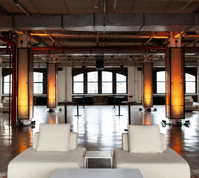 Spacious event venue with modern decor at NeueHouse Madison Square for networking and gatherings.