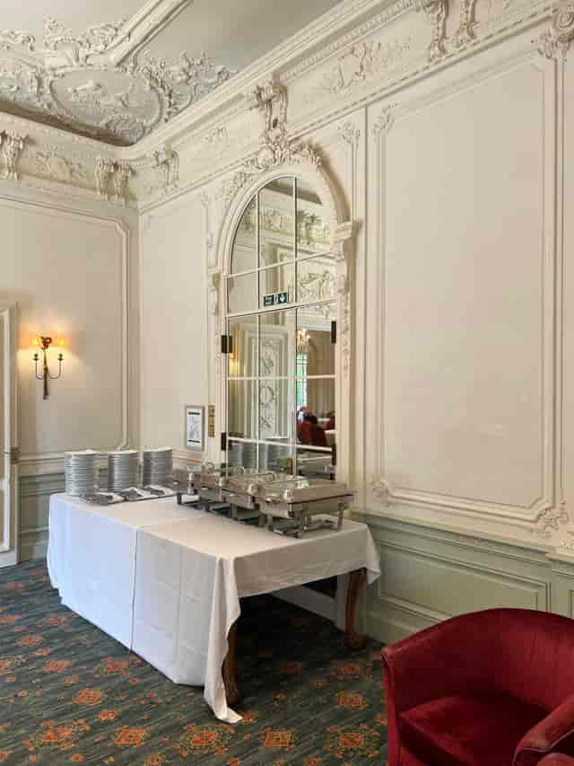 Elegant catering setup with lavender decor at Warren House Hotel for formal events.