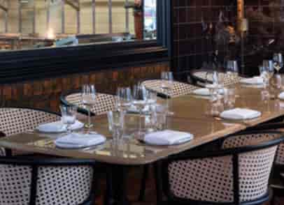 Elegant dining table at Arros QD, perfect for corporate dinners and private events.