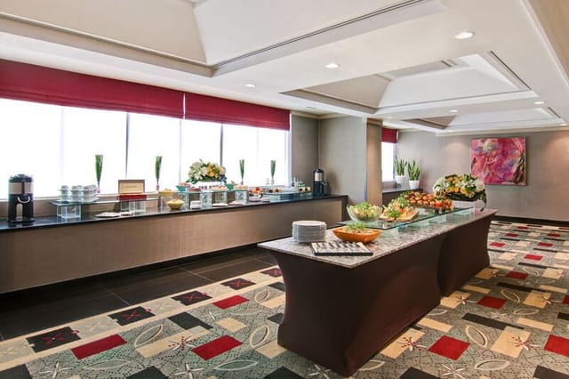 Elegant event space at DoubleTree Toronto with buffet setup for conferences and networking.