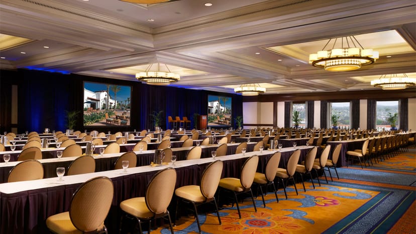 Poinsettia Ballroom at Omni La Costa Resort, elegant conference setup for corporate events.