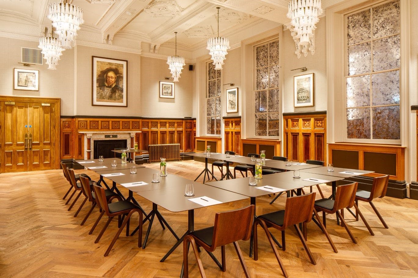 Sophisticated meeting room with chandeliers at Municipal Hotel Liverpool for professional events.