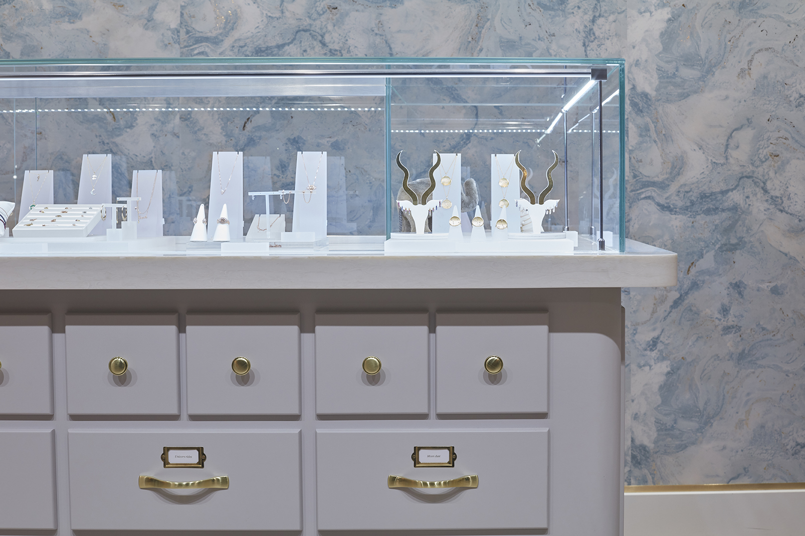Sleek jewelry display case at The Alkemistry for upscale events and celebrations.