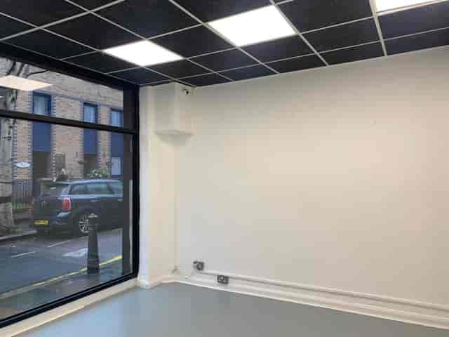 Blank meeting space in Space 61, ideal for events with natural light and minimal decor.