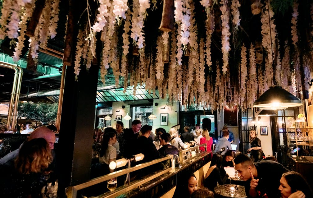 Vibrant floral decor in The Forest, Gun London for networking and social events.