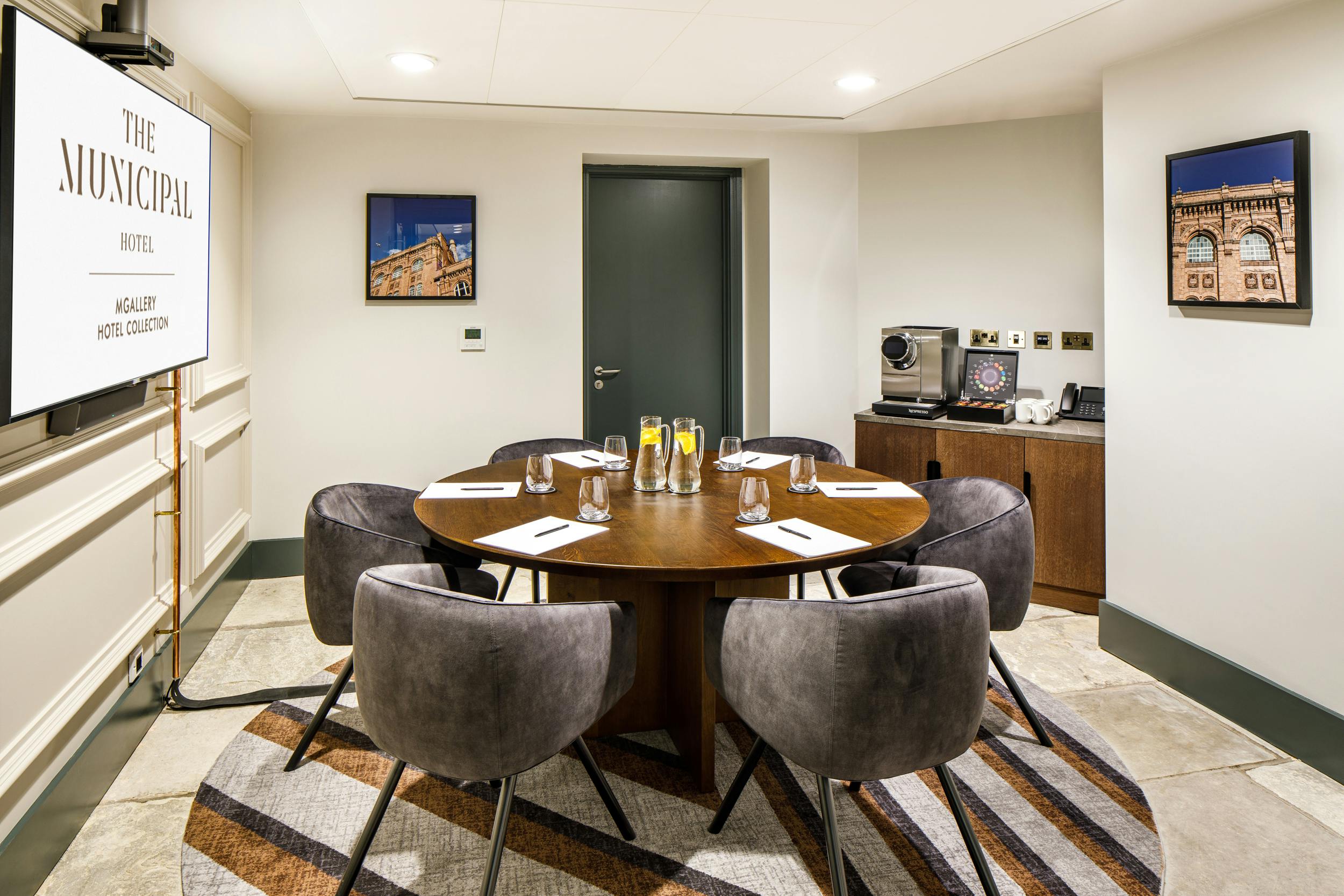 Meeting room at Baltic, Municipal Hotel Liverpool, featuring a round table for intimate gatherings.