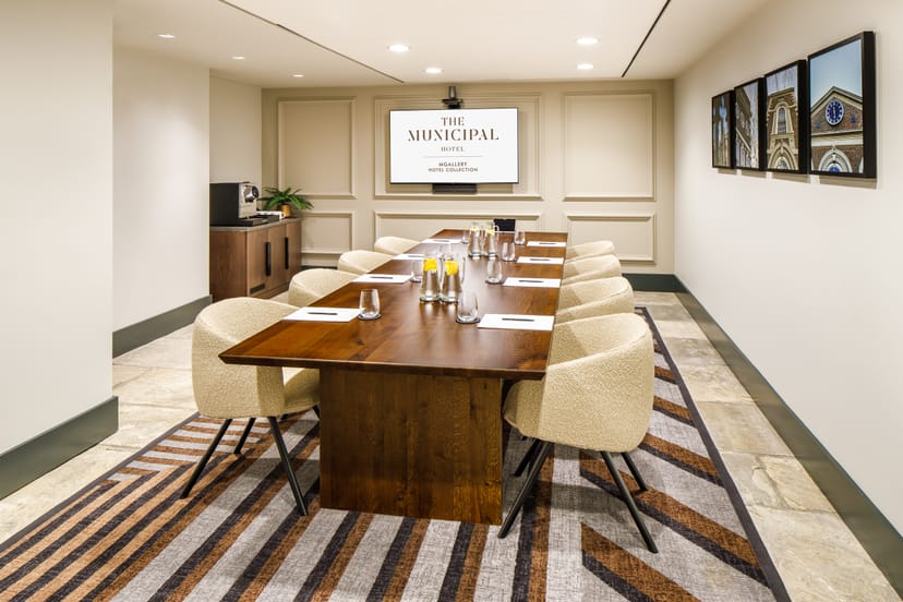 Ropewalks meeting room in Liverpool with wooden table, ideal for professional events.