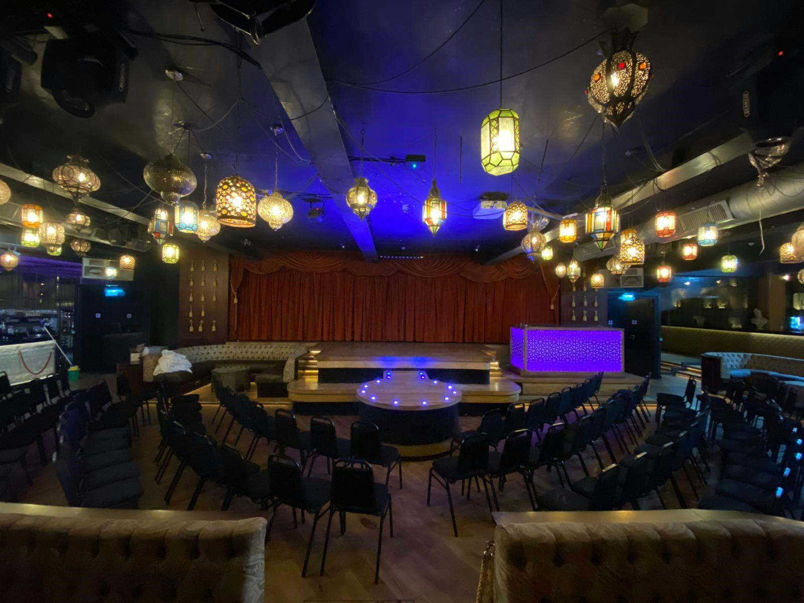 Versatile event space in Impossible Theatre, Manchester with intimate seating for gatherings.