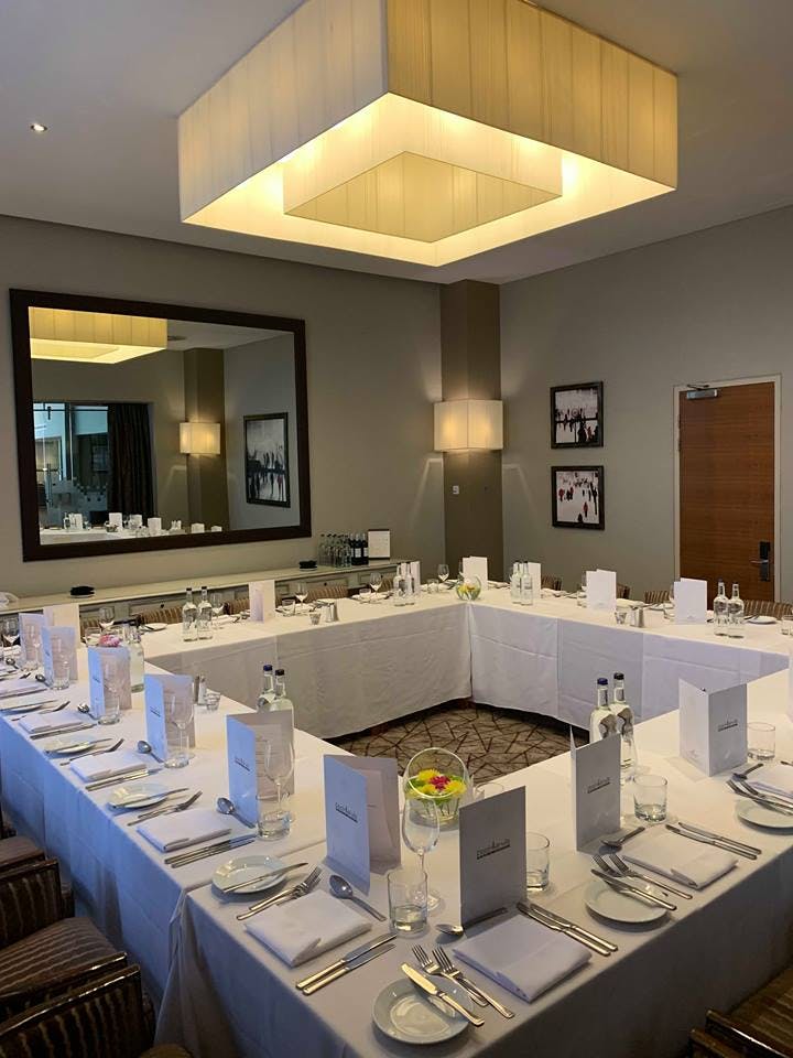 Private dining room at Crowne Plaza London Docklands, U-shape setup for meetings.