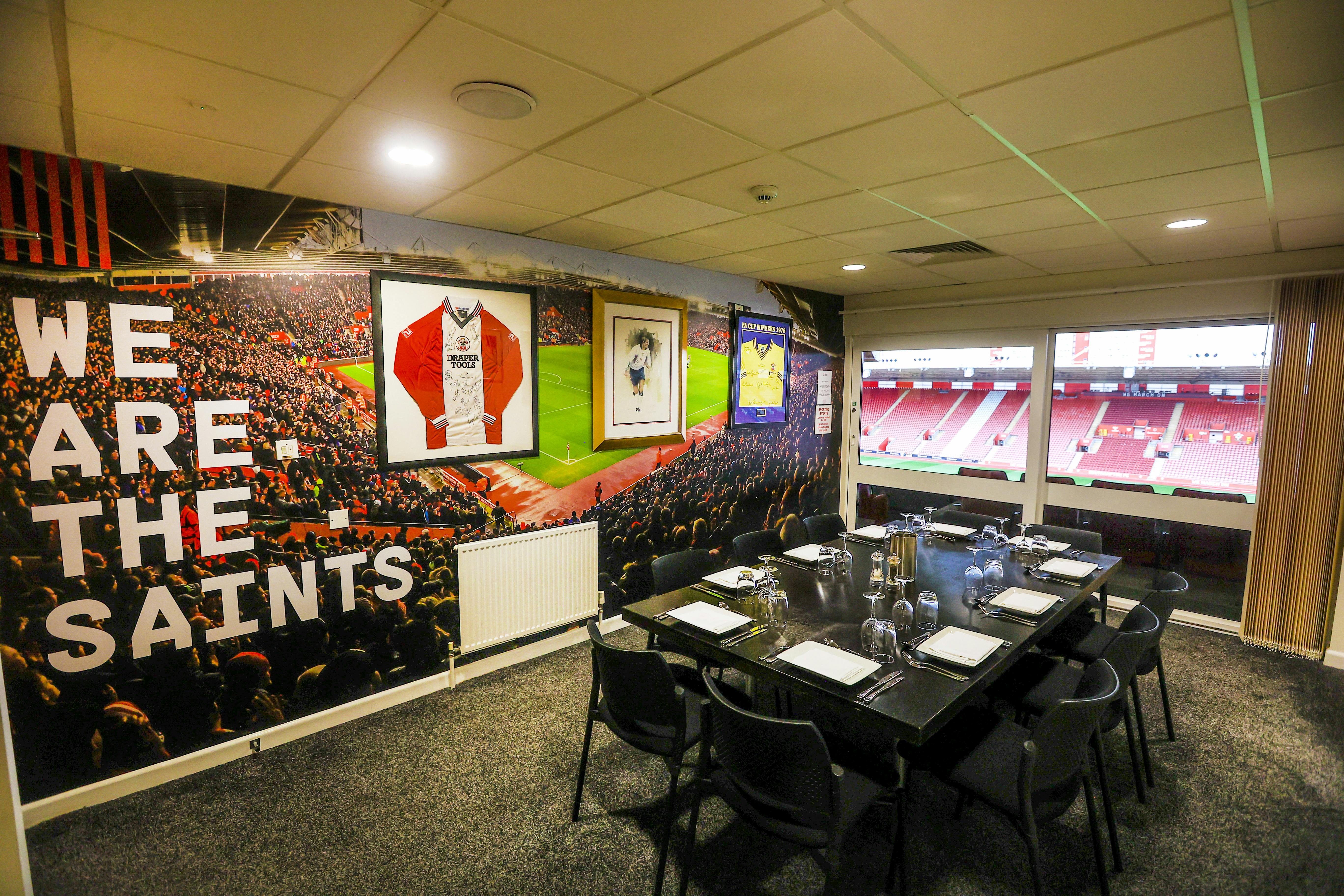 Stylish meeting room at Southampton FC for corporate events with vibrant decor.