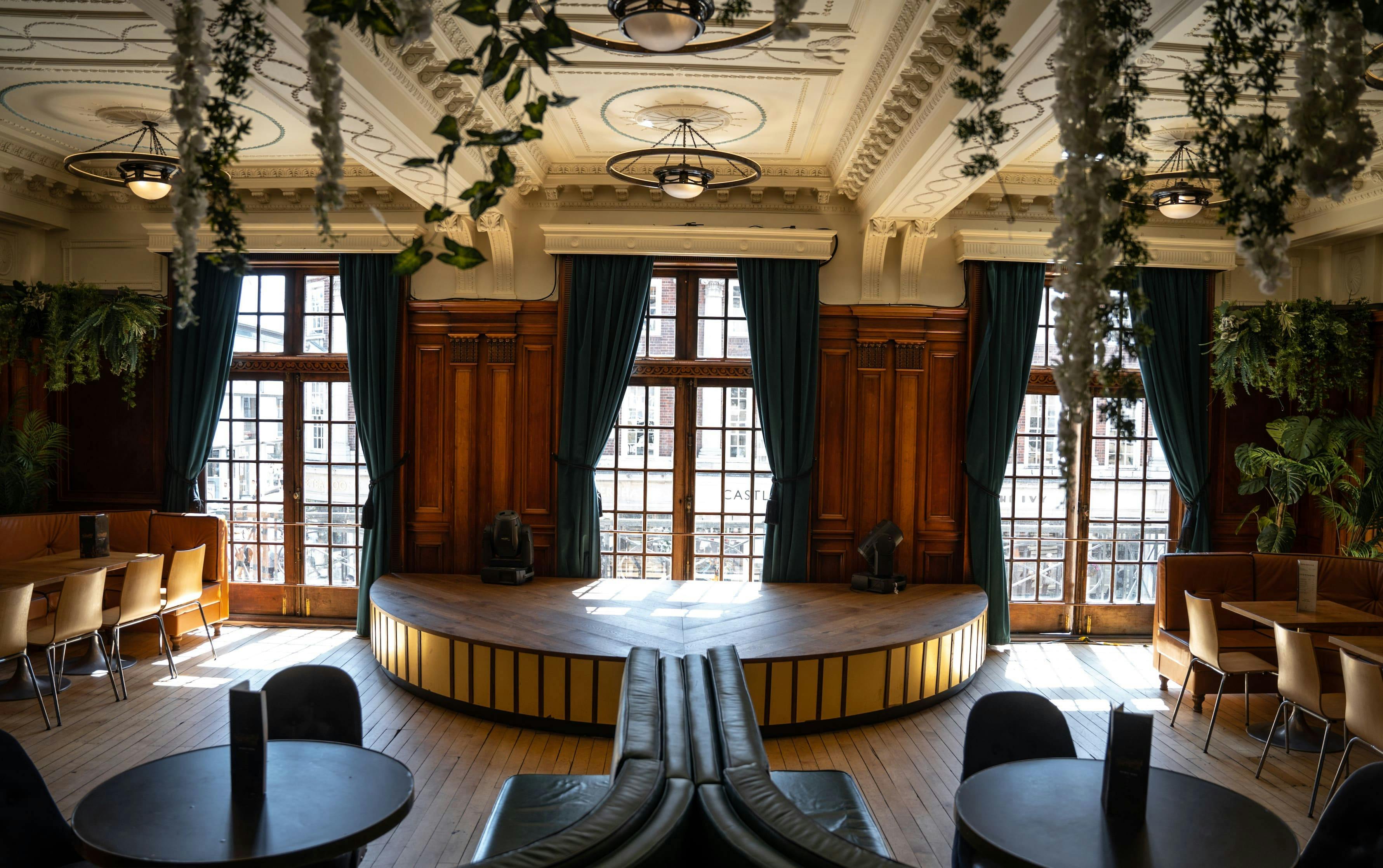 Elegant event space with circular stage, ideal for meetings and gatherings in York.