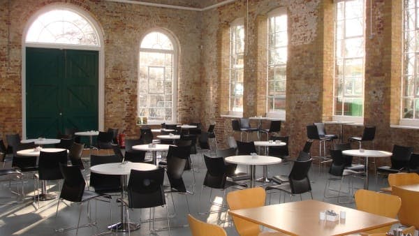 Gunpowder Café venue with exposed brick, ideal for workshops and networking events.