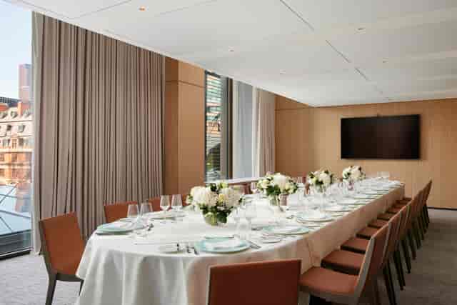 Elegant dining setup with swans in Pan Pacific London for corporate events.
