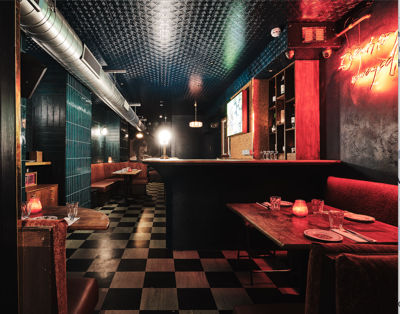 Chick N Sours: modern venue with cozy seating for intimate gatherings and events. - Banner