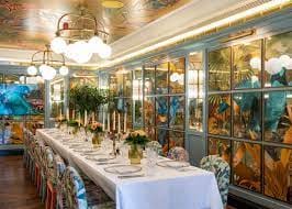 Elegant dining setup in Butterfly Room, The Ivy in the Park for upscale events.