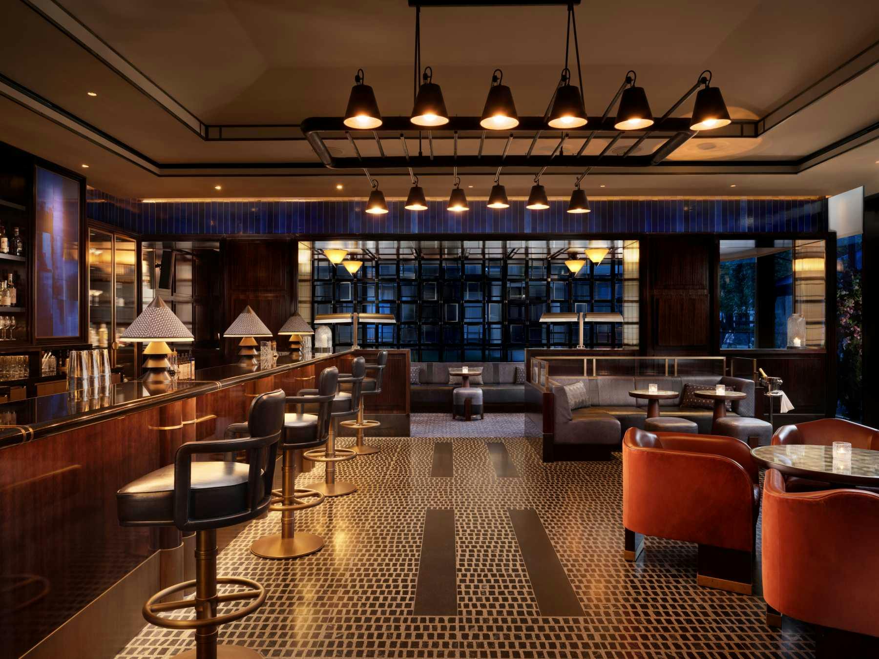 Sophisticated Nobu Bar lounge with elegant furnishings, ideal for networking events.