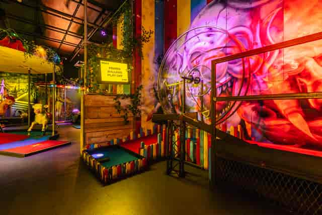 Bozo at Junkyard Golf Club, vibrant venue for unique events and team-building activities.
