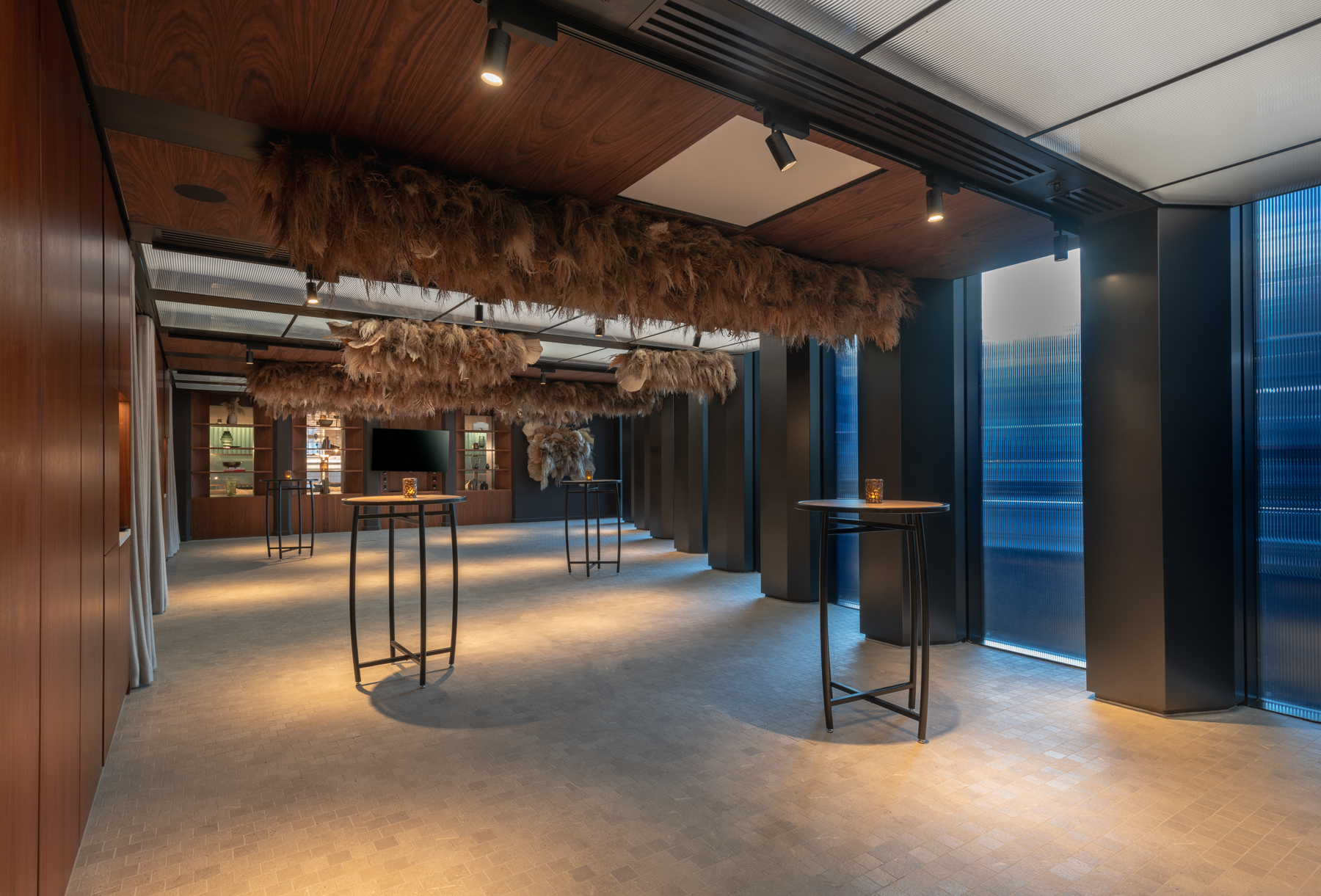 Modern event space at Dunstan Den, Canopy by Hilton, ideal for networking and receptions.