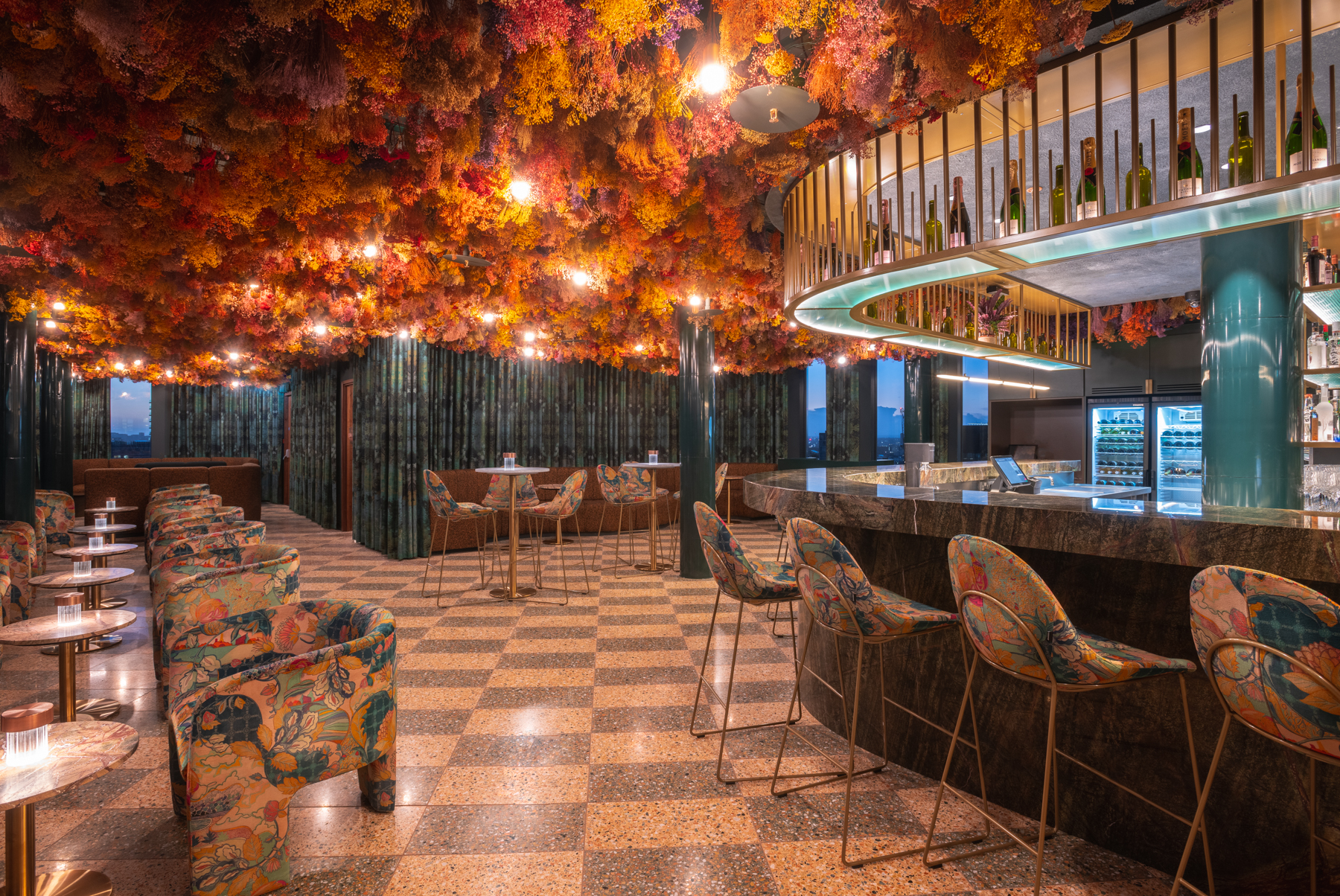 Florattica Rooftop London with floral ceiling, ideal for cocktail receptions and networking events.