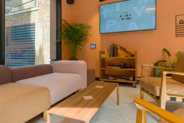 Modern lounge area with soft seating for networking and meetings at The Form Rooms.